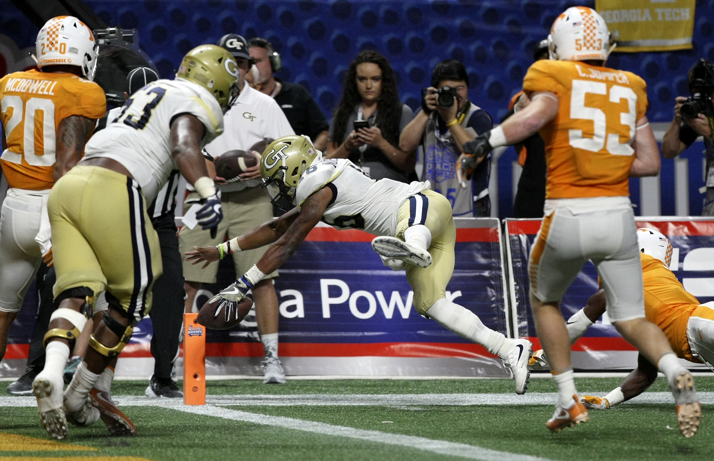 Georgia Tech quarterback TaQuon Marshall (16) dives for a touchdown against Tennessee during the Chick-fil-A Kickoff Game at Mercedes-Benz Stadium on Monday, Sept. 4, in Atlanta, Ga.