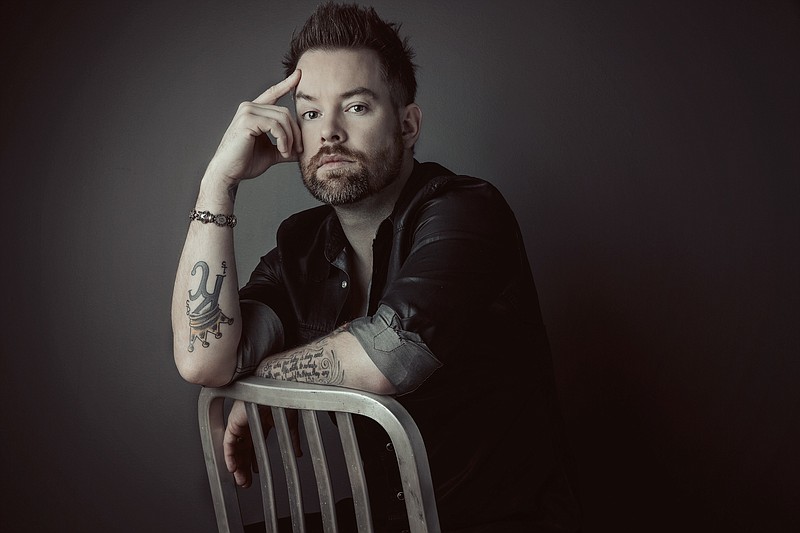 David Cook's new single is "Gimme Heartbreak," with lyrics that are a "melding of every bad relationship I've been in."