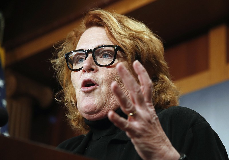 
              FILE - In this March 14, 2017, file photo, Sen. Heidi Heitkamp, D-N.D., speaks during a news conference on Capitol Hill in Washington. Heitkamp is the only statewide-elected Democrat in heavily Republican North Dakota, where President Donald Trump rolled to a win last year and the GOP is optimistic about knocking out the senator in next year's midterm elections. (AP Photo/Manuel Balce Ceneta, File)
            