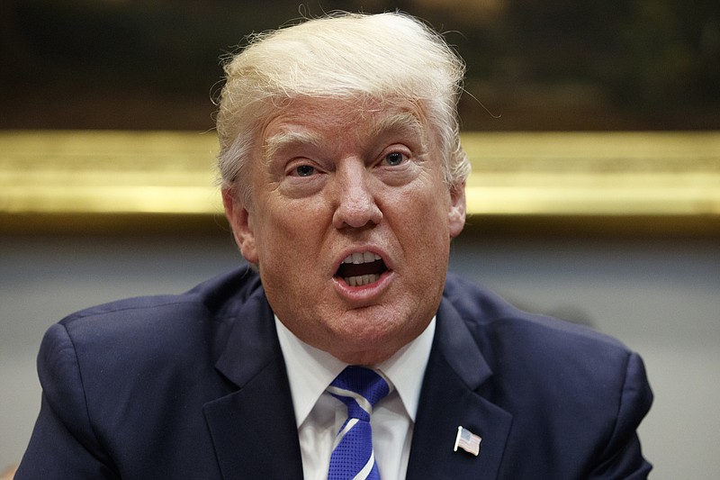 President Donald Trump speaks during a meeting with Congressional leaders and administration officials in the Roosevelt Room of the White House on Tuesday, Sept. 5, 2017, in Washington. (AP Photo/Evan Vucci)