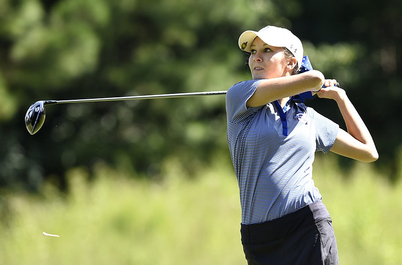 Cleveland senior Rheagan Hall watches the flight of her drive on the second tee during the City Prep tournament on Wednesday at The Bear Trace at Harrison Bay.