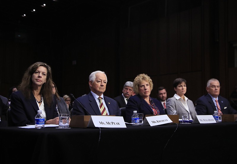 From left, Tennessee Department of Commerce and Insurance Commissioner Julie Mix McPeak, Washington State Insurance Commissioner Mike Kreidler; Alaska Division of Insurance Director Lori Wing-Heier; Insurance Commissioner of Pennsylvania Theresa Miller and Oklahoma Department of Insurance Commissioner John Doak, testify during a Senate Health, Education, Labor, and Pensions Committee hearing on the individual health insurance market for 2018 on Capitol Hill in Washington, Wednesday, Sept. 6, 2017. (AP Photo/Manuel Balce Ceneta)