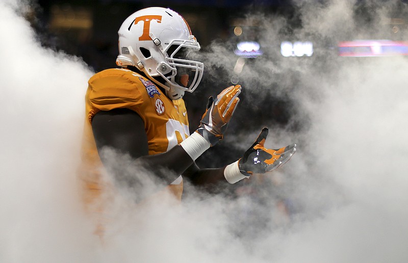 Tennessee defensive lineman Paul Bain takes the field before the start of Monday night's Chick-fil-A Kickoff Game against Georgia Tech at Mercedes-Benz Stadium in Atlanta. Bain made a crucial play in the Vols' 42-41 double-overtime win.