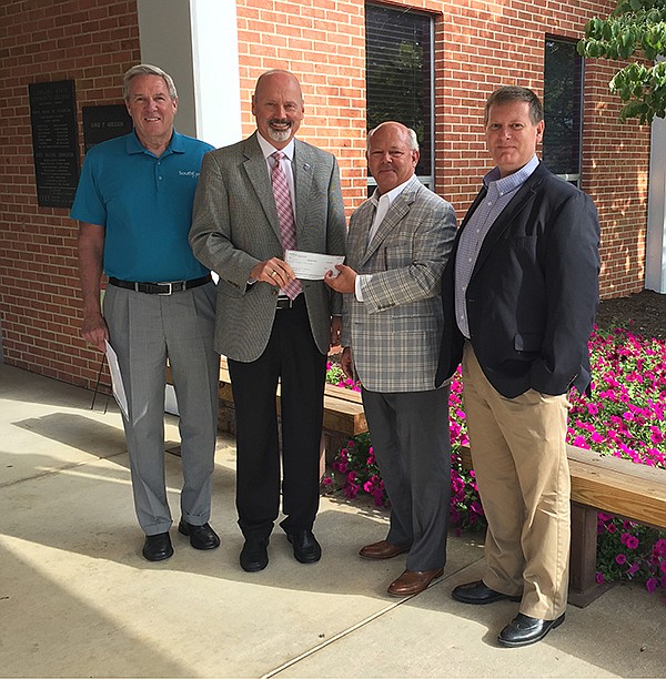 Southeast Bank recently made a $26,000 donation to Cleveland State Community College. From left, are Monty Montgomery, Southeast Bank president; Dr. Bill Seymour, CSCC president; DeWayne Morrow, Southeast Bank city president; and Dr. Tommy Wright, CSCC vice president for finance and advancement.