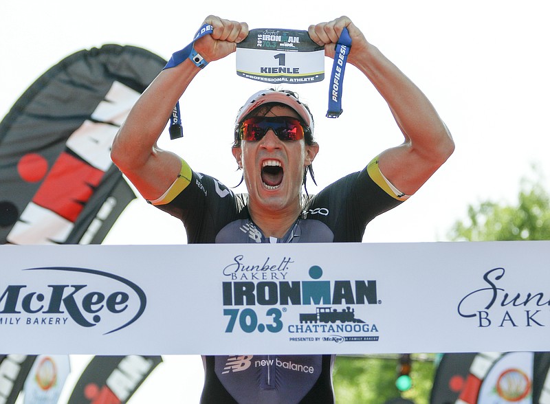 Staff Photo by Dan Henry / The Chattanooga Times Free Press- 5/22/16. Sebastian Kienle from Muhlacker, Germany, makes his way down the chute to place first in the 2016 Sunbelt Bakery Ironman 70.3 event in downtown Chattanooga on Sunday, May 22. 