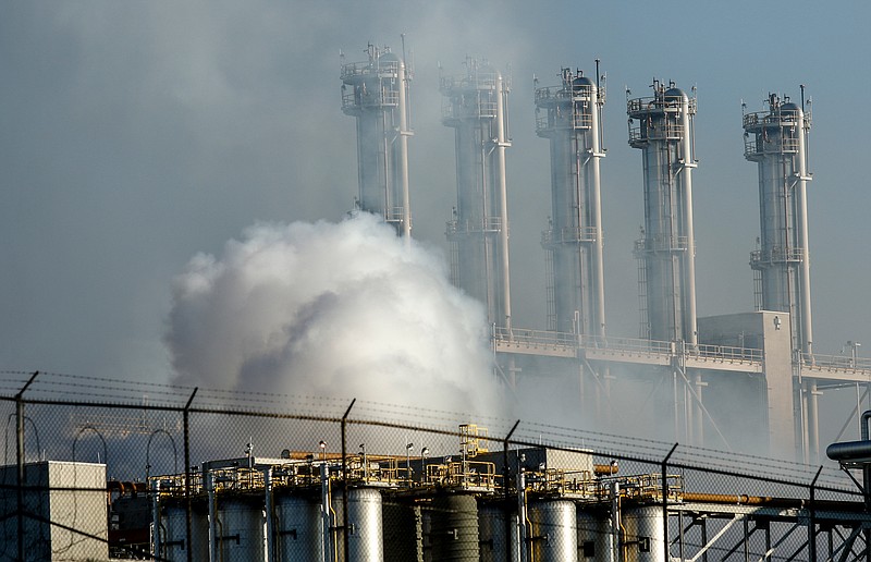 Clouds billow from the Wacker polysilicon chemical plant after an explosion released a hydrogen chemical gas on Thursday, Sept. 7, 2017, in Charleston, Tenn. The explosion closed the plant, but a statement from Wacker says air quality was unaffected.