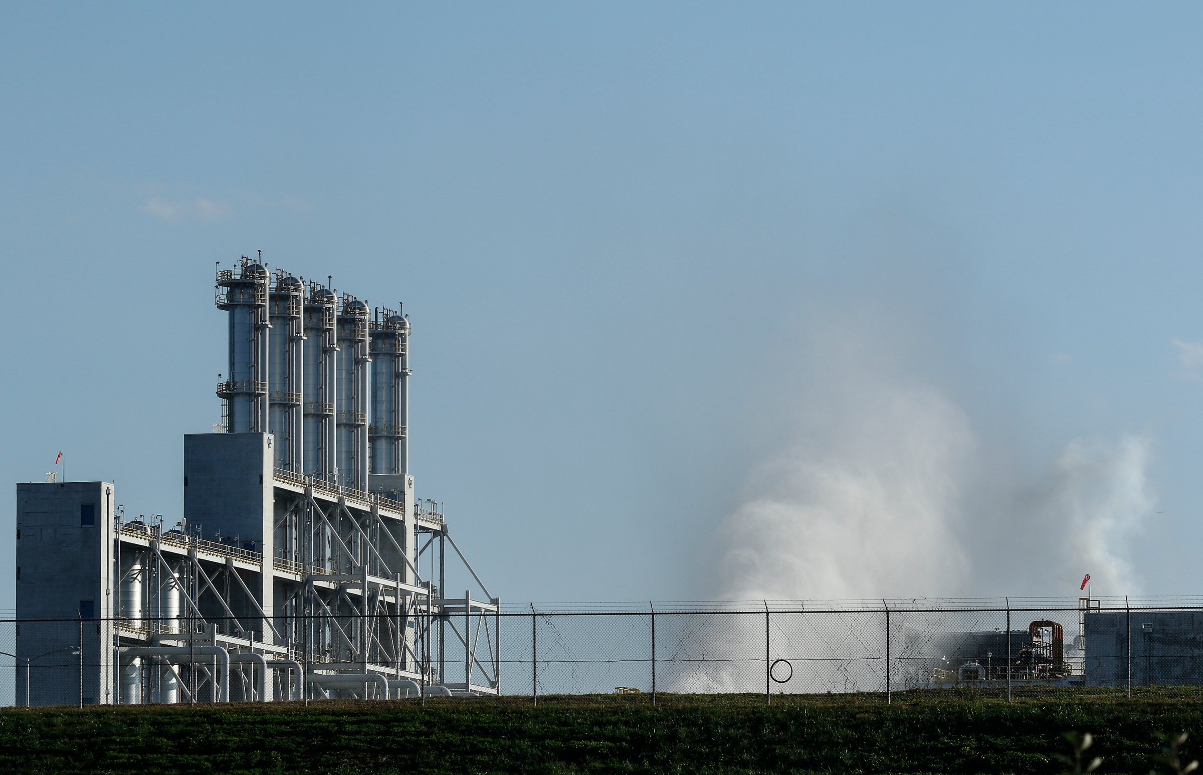Clouds billow from the Wacker polysilicon chemical plant after an explosion released a hydrogen chemical gas on Thursday, Sept. 7, 2017, in Charleston, Tenn. The explosion closed the plant, but a statement from Wacker says air quality was unaffected.
