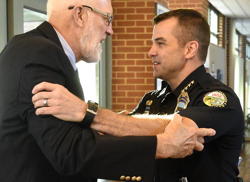 From left, Franklin McCallie greets Chattanooga Police Chief David Roddy before Roddy spoke at the Chattanooga Area Chamber of Commerce breakfast at the Bessie Smith Cultural Center on September 7, 2017. 