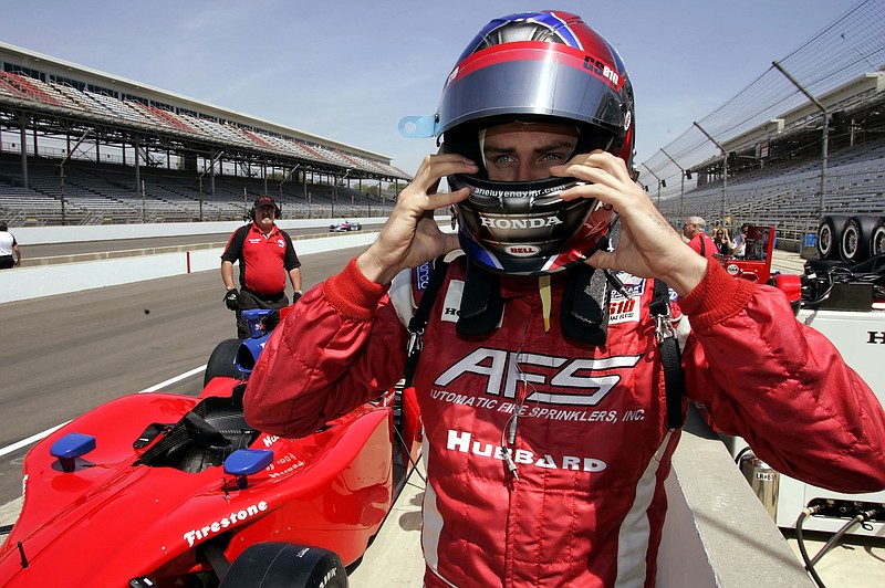 
              FILE - In this May 8, 2006, file photo, driver Arie Luyendyk Jr.adjust his helmet as he prepares to practice for the 90th running of the Indianapolis 500 at the Indianapolis Motor Speedway in Indianapolis. Luyendyk was announced as the leading man for ABC's "The Bachelor" on Sept. 7, 2017. (AP Photo/Tom Strattman, File)
            