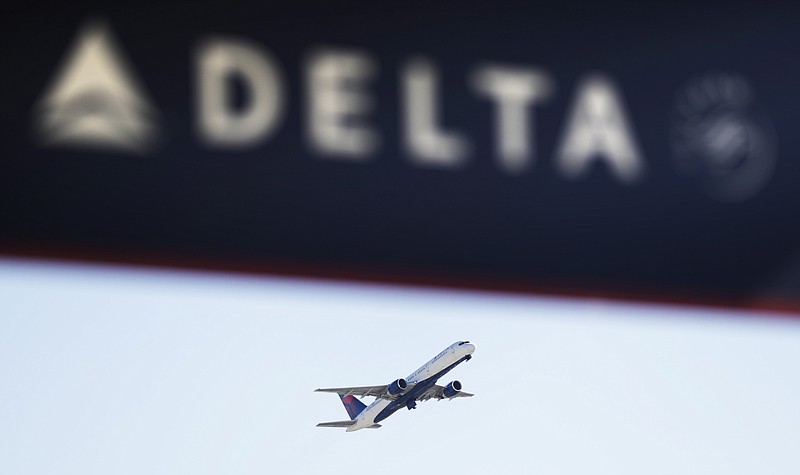 
              FILE - In this Jan. 30, 2017, file photo, a Delta Air Lines flight takes off from Hartsfield-Jackson Atlanta International Airport in Atlanta. A Delta plan flew in and out of San Juan, Puerto Rico, on Sept. 6, 2017, just before Hurricane Irma battered the island. (AP Photo/David Goldman, File)
            