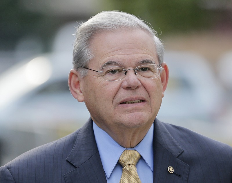 Sen. Bob Menendez arrives to court for his federal corruption trial in Newark, N.J., Wednesday, Sept. 6, 2017. The trial will examine whether he lobbied for Florida ophthalmologist Dr. Salomon Melgen's business interests in exchange for political donations and gifts. Both have pleaded not guilty. (AP Photo/Seth Wenig)