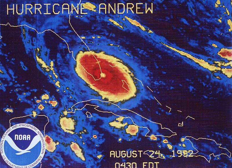 
              FILE- This Aug. 24, 1992 file image provided by NOAA shows a NOAA GOES-7 thermal infrared geostationary satellite image of Hurricane Andrew approaching landfall south of Miami. For an entire generation in South Florida, Hurricane Andrew was the monster storm that reshaped a region. Irma is likely to blow that out of the water. Bigger and with a 90-degree different path of potential destruction, Irma is forecast to hit lots more people and buildings than 1992’s Andrew, said experts, including veterans of Andrew. (NOAA via AP, File)
            