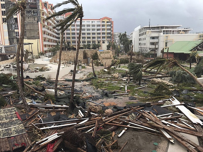 
              This Sept. 6, 2017 photo shows storm damage in the aftermath of Hurricane Irma in St. Martin. Irma cut a path of devastation across the northern Caribbean, leaving thousands homeless after destroying buildings and uprooting trees. Significant damage was reported on the island known as St. Martin in English which is divided between French Saint-Martin and Dutch Sint Maarten. (Jonathan Falwell via AP)
            