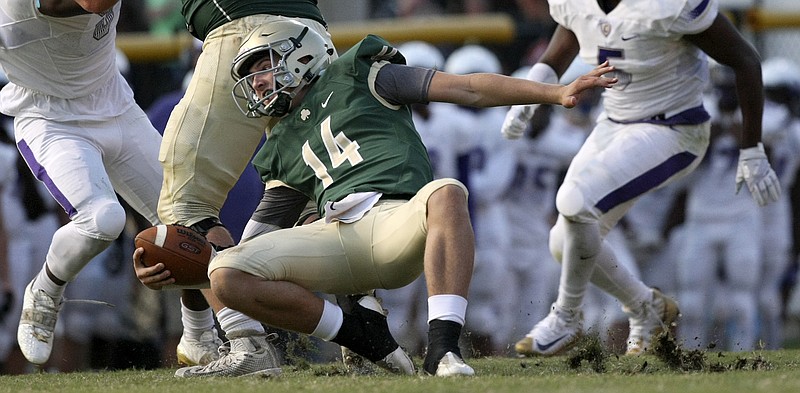 Notre Dame's Landon Allen (14) looses his footing against Central at Notre Dame's Jim Eberle Field on Friday, Sept. 8, in Chattanooga, Tenn.