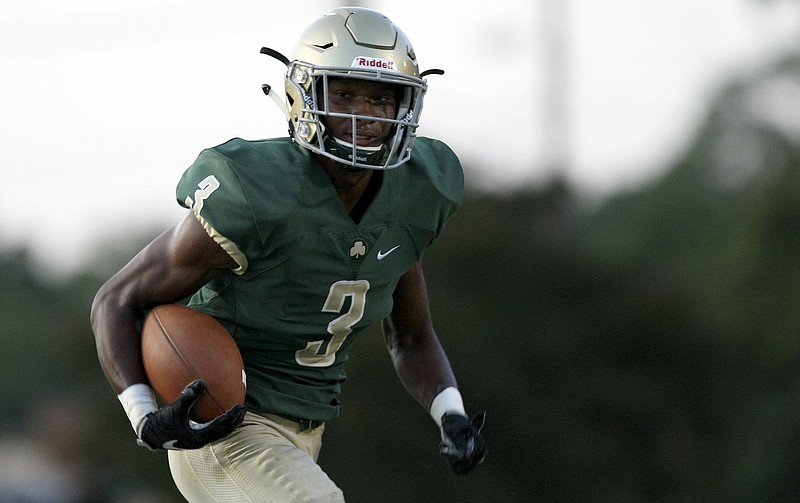 Notre Dame's Cameron Wynn (3) rushes for a touchdown against Central at Notre Dame's Jim Eberle Field on Friday, Sept. 8, in Chattanooga, Tenn.