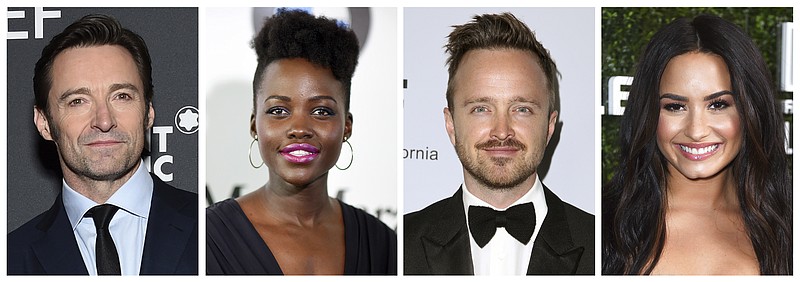 
              This combination photo shows, from left, Hugh Jackman, Lupita Nyong’o, Aaron Paul and Demi Lovato who will co-host this year’s Global Citizen Festival, an annual free event held in New York's Central Park on Sept. 23. (AP Photo/File)
            