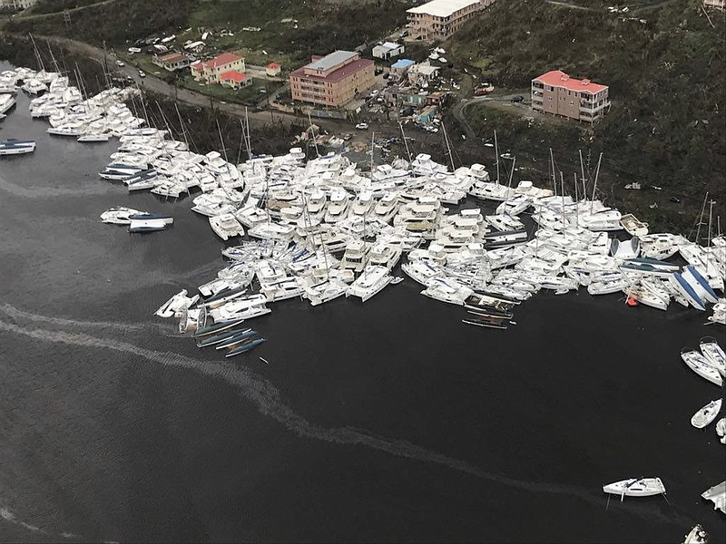 
              This photo provided by Caribbean Buzz shows boats clustered together after Hurricane Irma Friday, Sept. 8, 2017. The death toll from Hurricane Irma has risen to 22 as the storm continues its destructive path through the Caribbean.
The dead include 11 on St. Martin and St. Barts, four in the U.S. Virgin Islands and four in the British Virgin Islands. There was also one each in Barbuda, Anguilla, and Barbados. The toll is expected to rise as rescuers reach some of the hardest-hit areas. (Caribbean Buzz via AP)
            