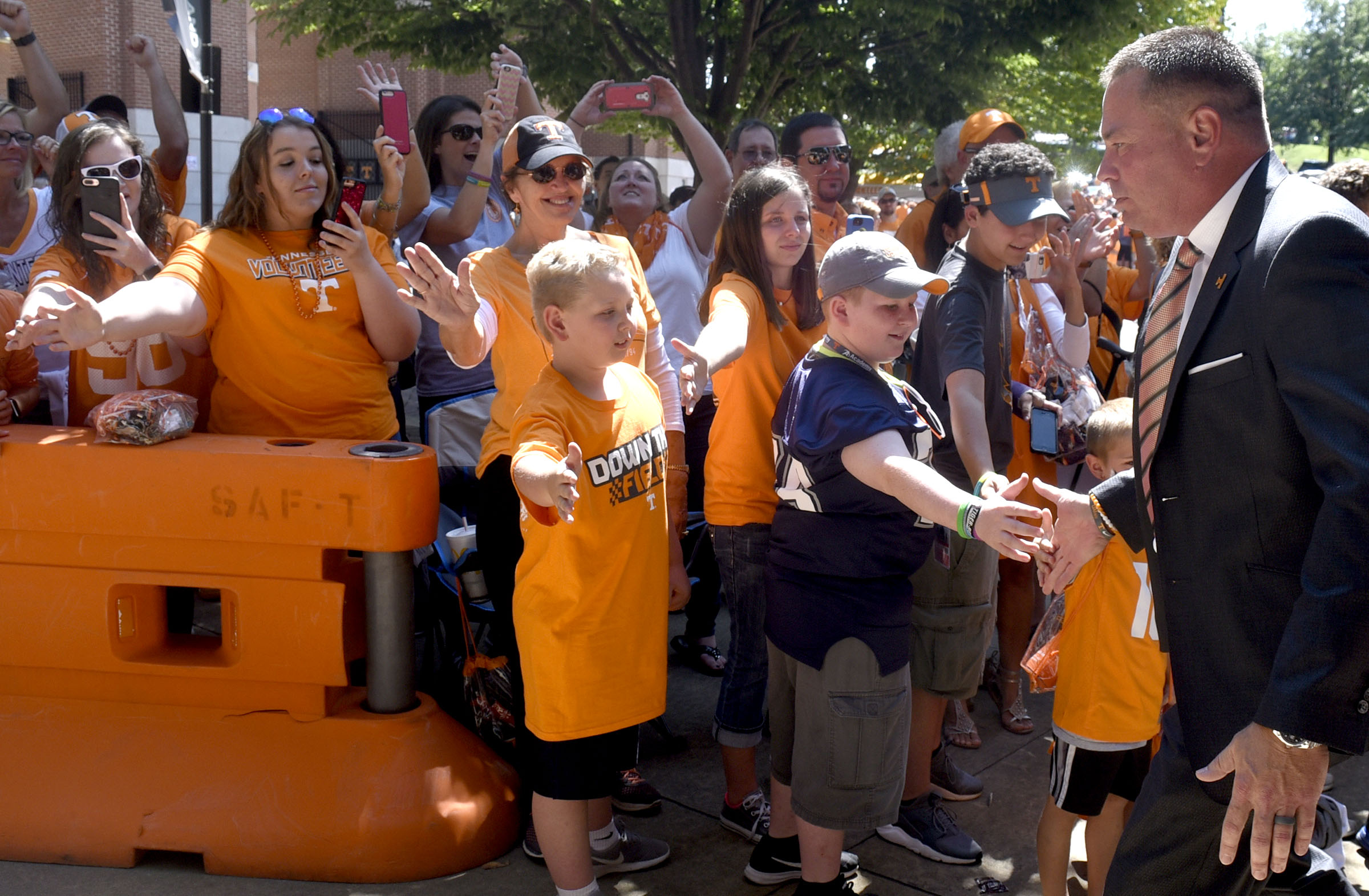 Tennessee head coach Butch Jones greets fans along the Vol Walk. The Indiana State Sycamores visited the University of Tennessee Volunteers at Neyland Stadium in NCAA football action of September 9, 2017.