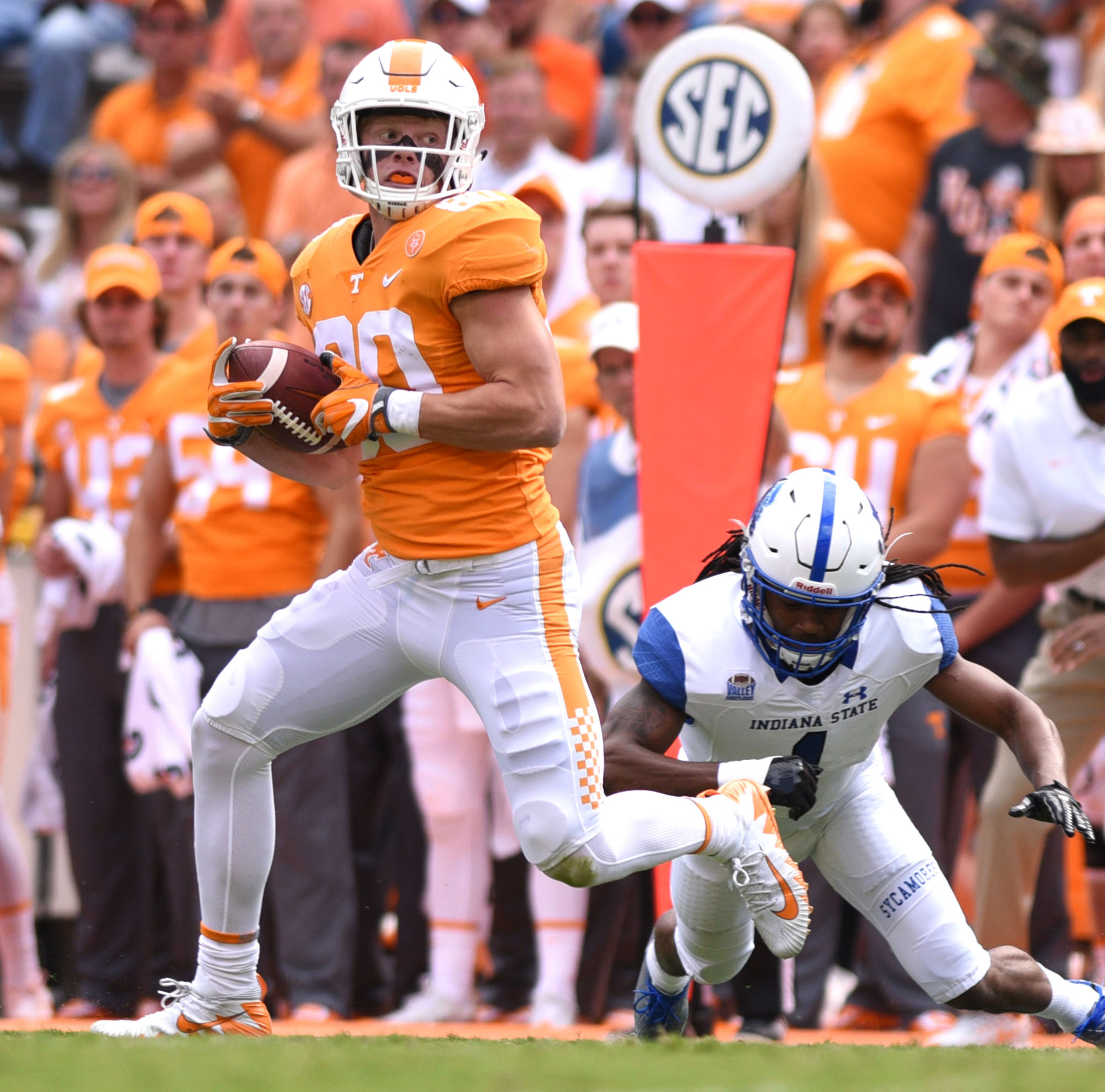 Tennessee's Eli Wolf (80) looks downfield after a pass reception. Wolf was injured on the play. The Indiana State Sycamores visited the University of Tennessee Volunteers at Neyland Stadium in NCAA football action of September 9, 2017.