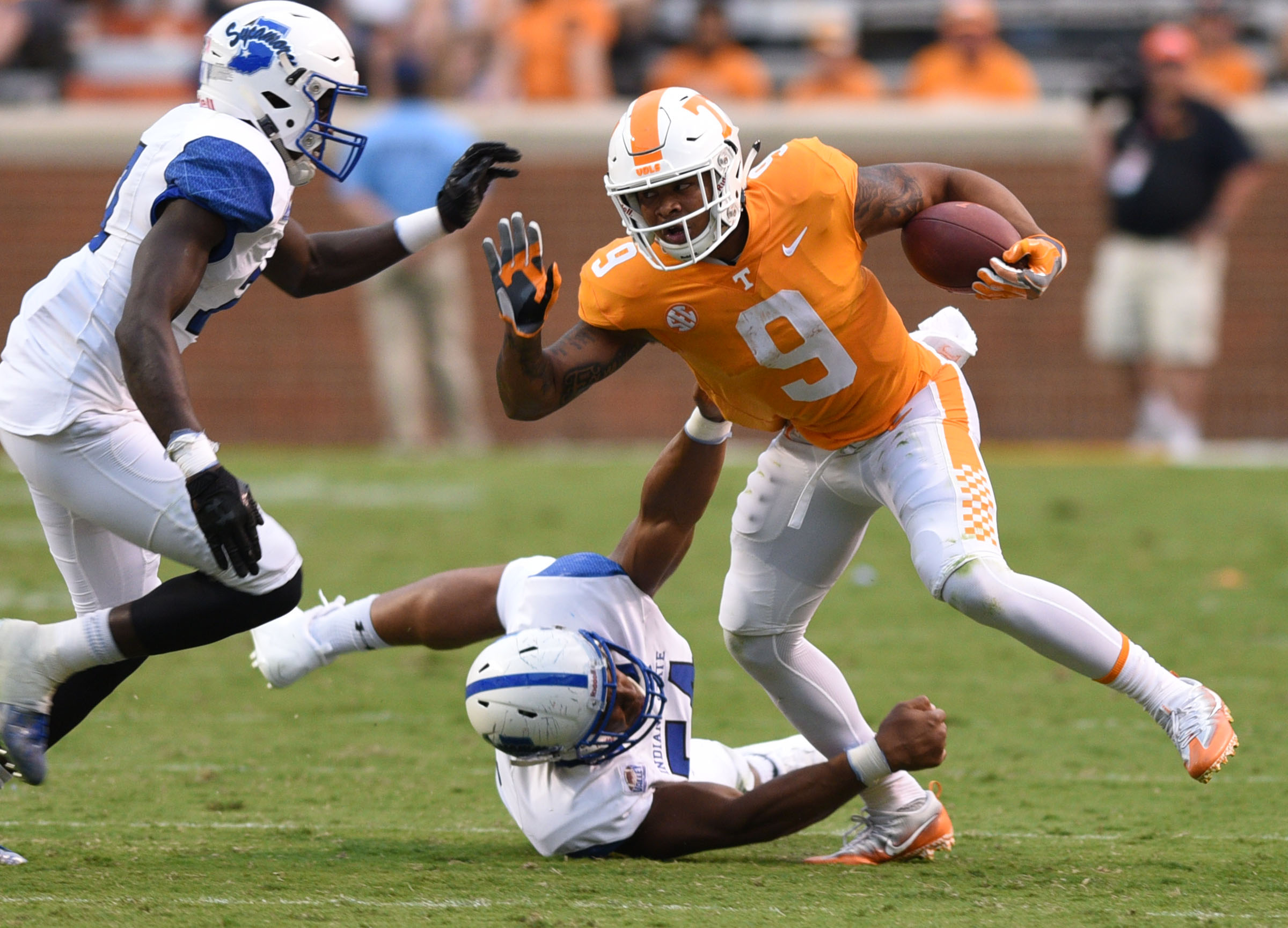 Tennessee's Tim Jordan (9) breaks several tackles on the way to a first down. The Indiana State Sycamores visited the University of Tennessee Volunteers at Neyland Stadium in NCAA football action of September 9, 2017.