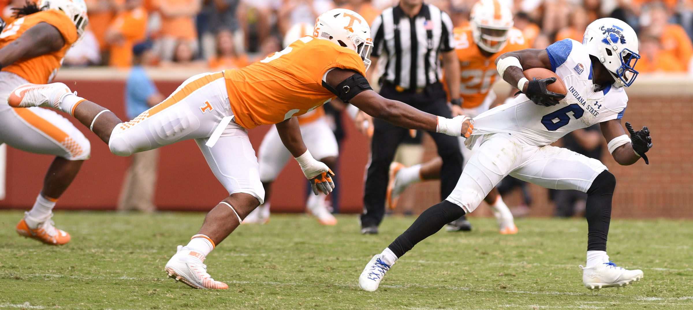 Tennessee's Kyle Phillips (5) gets a hold of Indiana State's LeMonte Booker's (6) jersey. The Indiana State Sycamores visited the University of Tennessee Volunteers at Neyland Stadium in NCAA football action of September 9, 2017.