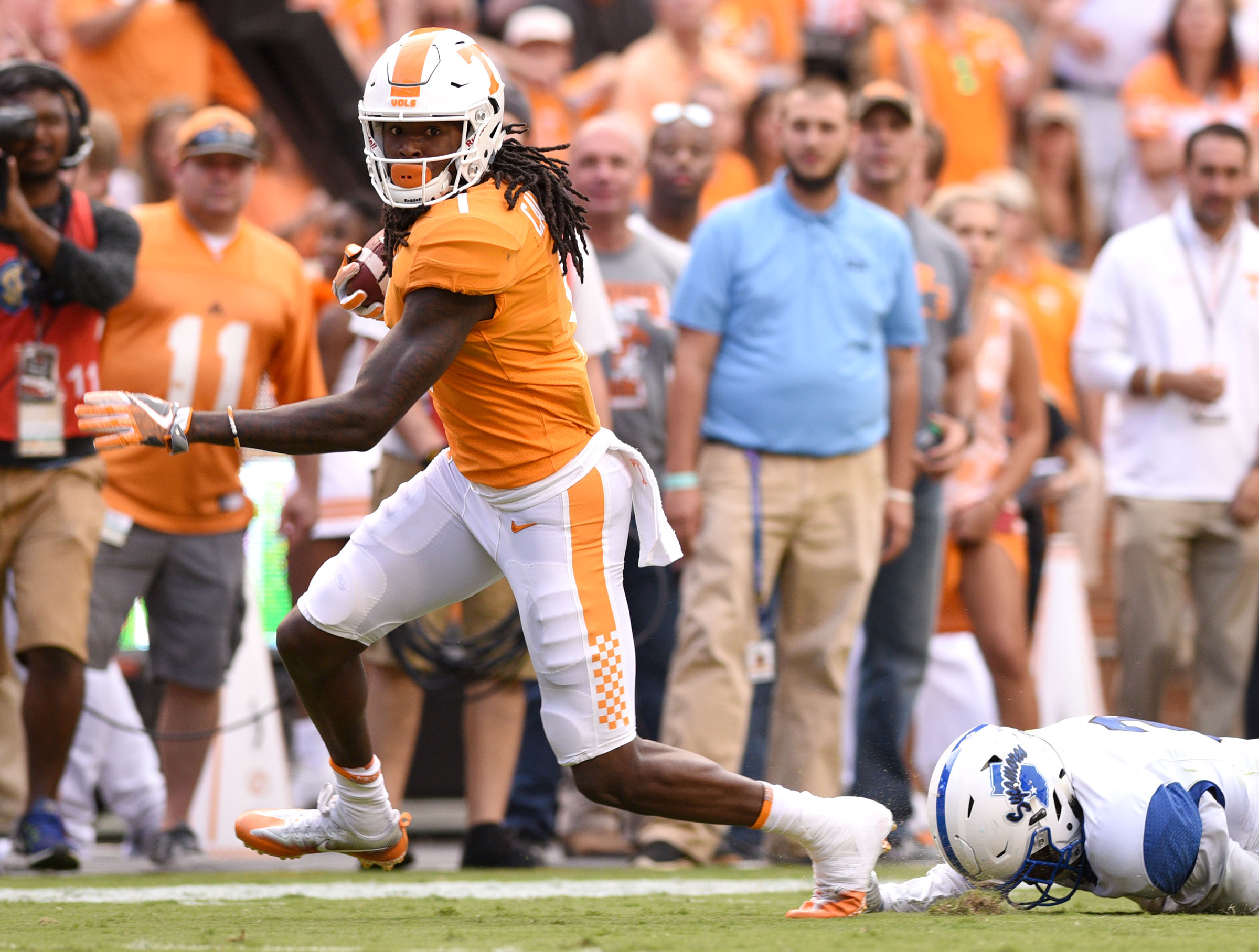 Tennessee's Marquez Callaway (1) escapes a Sycamore tackler to score a 3rd quarter touchdown. The Indiana State Sycamores visited the University of Tennessee Volunteers at Neyland Stadium in NCAA football action of September 9, 2017.