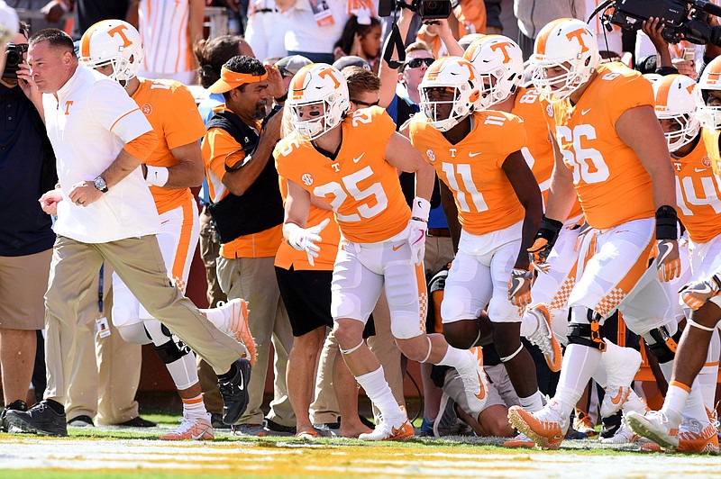 Butch Jones and the Vols enter the T to take the field.  The Indiana State Sycamores visited the University of Tennessee Volunteers at Neyland Stadium in NCAA football action of September 9, 2017. 