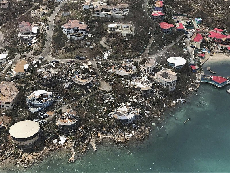 
              This photo provided by Caribbean Buzz shows the destruction left in the wake of Hurricane Irma Friday, Sept. 8, 2017, in the U.S. Virgin Islands The death toll from Hurricane Irma has risen to 22 as the storm continues its destructive path through the Caribbean. The dead include 11 on St. Martin and St. Barts, four in the U.S. Virgin Islands and four in the British Virgin Islands. There was also one each in Barbuda, Anguilla, and Barbados. The toll is expected to rise as rescuers reach some of the hardest-hit areas. (Caribbean Buzz via AP)
            