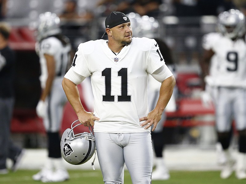 
              FILE - In this Aug. 12, 2017, file photo, Oakland Raiders kicker Sebastian Janikowski looks on before a NFL preseason football game against the Arizona Cardinals in Glendale, Ariz. The Raiders have Janikowski on injured reserve with a sore back and promoted Giorgio Tavecchio to the active roster. (AP Photo/Ross D. Franklin, File)
            