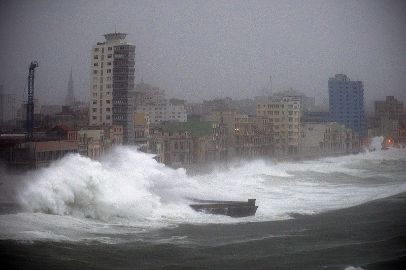 
              Strong waves brought by Hurricane Irma hit the Malecon seawall in Havana, Cuba, late Saturday, Sept. 9, 2017. (AP Photo/Ramon Espinosa)
            