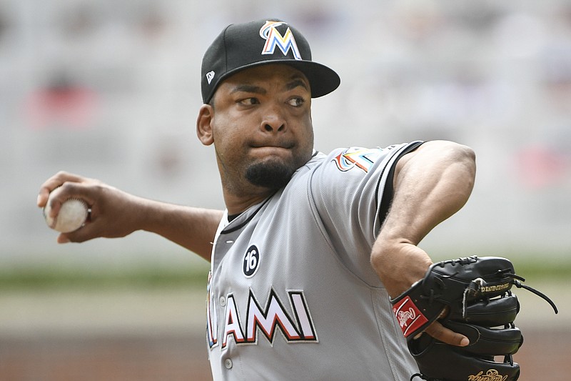 
              Miami Marlins' Odrisamer Despaigne pitches during the first inning of a baseball game against the Atlanta Braves, Sunday, Sept. 10, 2017, in Atlanta. (AP Photo/John Amis)
            