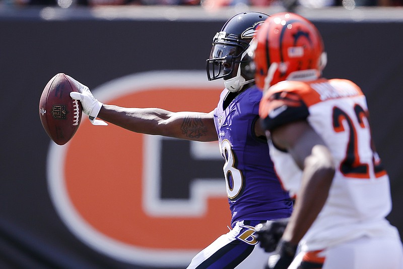 
              Baltimore Ravens wide receiver Jeremy Maclin (18) runs in a touchdown against Cincinnati Bengals cornerback William Jackson (22) in the first half of an NFL football game, Sunday, Sept. 10, 2017, in Cincinnati. (AP Photo/Gary Landers)
            