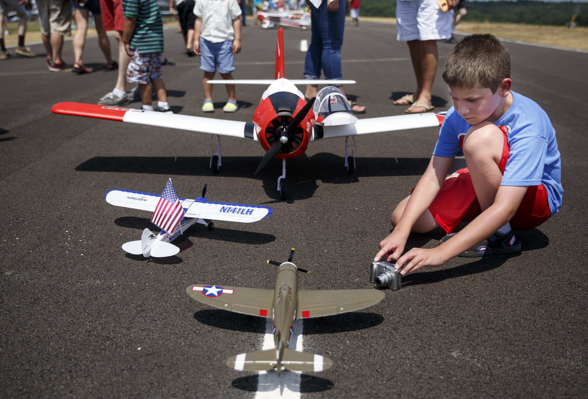 Elijah Ricketts takes pictures of RC planes at the fifth annual Siskin Children's Institute Air Show.