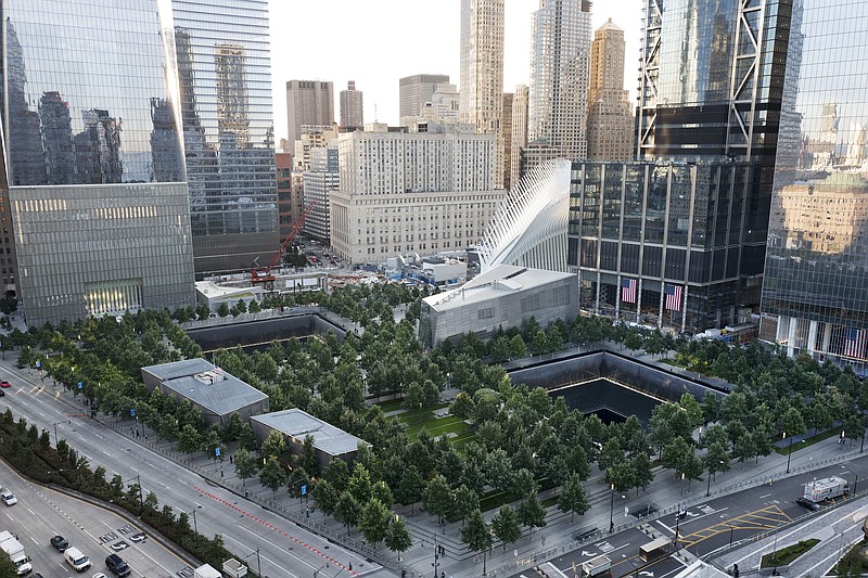 The National September 11 Memorial and Museum are set for a memorial service, Monday, Sept. 11, 2017, in New York. Thousands of 9/11 victims' relatives, survivors, rescuers and others are expected to gather Monday at the World Trade Center to remember the deadliest terror attack on American soil. Nearly 3,000 people died when hijacked planes slammed into the trade center, the Pentagon and a field near Shanksville, Pa., on Sept. 11, 2001. (AP Photo/Mark Lennihan)
