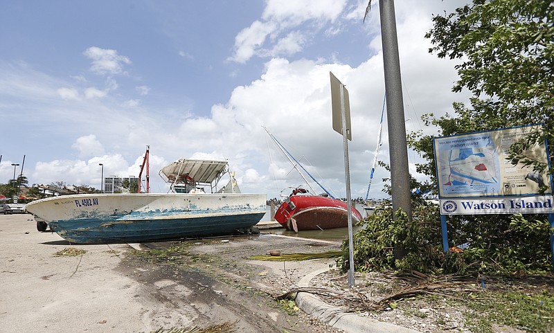 A view of a boats washed ashore at Watson Island in the Hurricane Irma aftermath on Monday, Sept. 11, 2017 in Miami. (David Santiago/Miami Herald via AP)