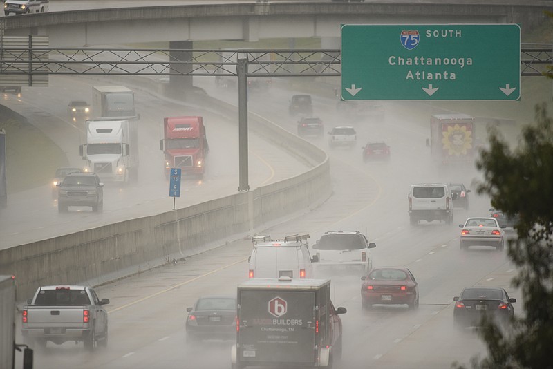 Interstate 75 traffic is peppered by rain and wind from the outer bands of tropical storm Irma on Monday, Sept. 11, 2017, afternoon at the Highway 153 interchange in Chattanooga.