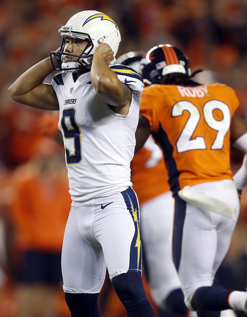 
              Los Angeles Chargers kicker Younghoe Koo (9) reacts after his field goal attempt was tipped and fell short of the goal post during the second half of an NFL football game against the Denver Broncos, Monday, Sept. 11, 2017, in Denver. The Broncos won 24-21. (AP Photo/David Zalubowski)
            