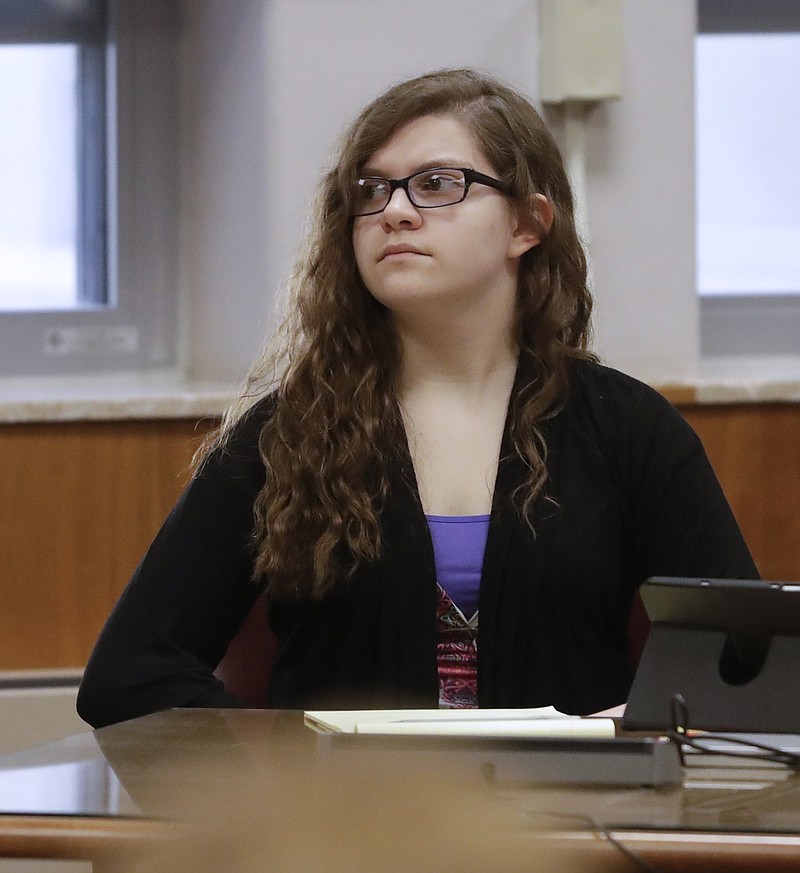 
              Anissa Weier listens during jury selection in her trial at Waukesha County Courthouse Monday, Sept 11, 2017, in Waukesha, Wis. Prosecutors allege that Weier and her friend, Morgan Geyser, lured classmate Payton Leutner into a Waukesha park in May 2014 and stabbed her 19 times. The girls have said it was an effort to  to please a fictional horror character known as Slender Man.  (AP Photo/Morry Gash, Pool)
            