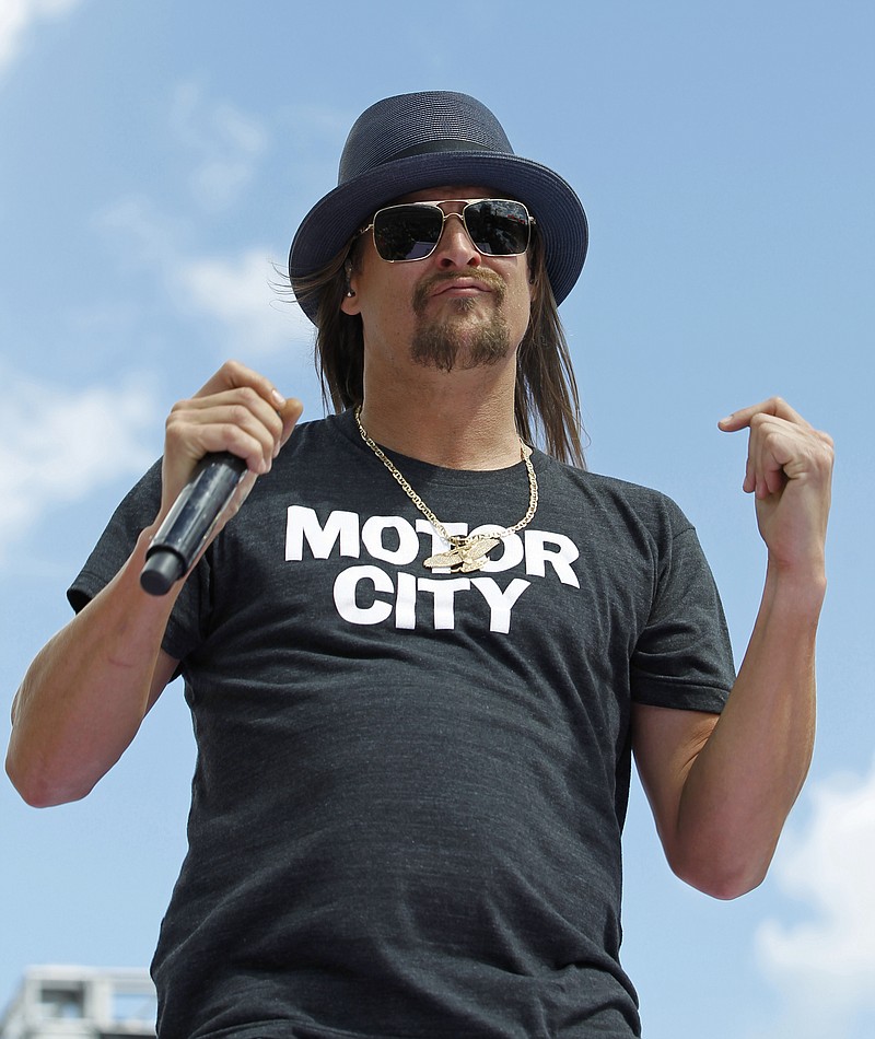 
              FILE - In this Feb. 22, 2015 file photo, Kid Rock performs at Daytona International Speedway in Daytona Beach, Fla. Kid Rock opens at  Little Caesars Arena, Detroit’s new sports arena, Tuesday night, Sept. 12, 2017, after two months of teasing a potential Republican run for U.S. Senate in Michigan. His publicist has said he will give fans exclusive insight on his political views and aspirations following his first song at Tuesday's concert. (AP Photo/Terry Renna, File)
            