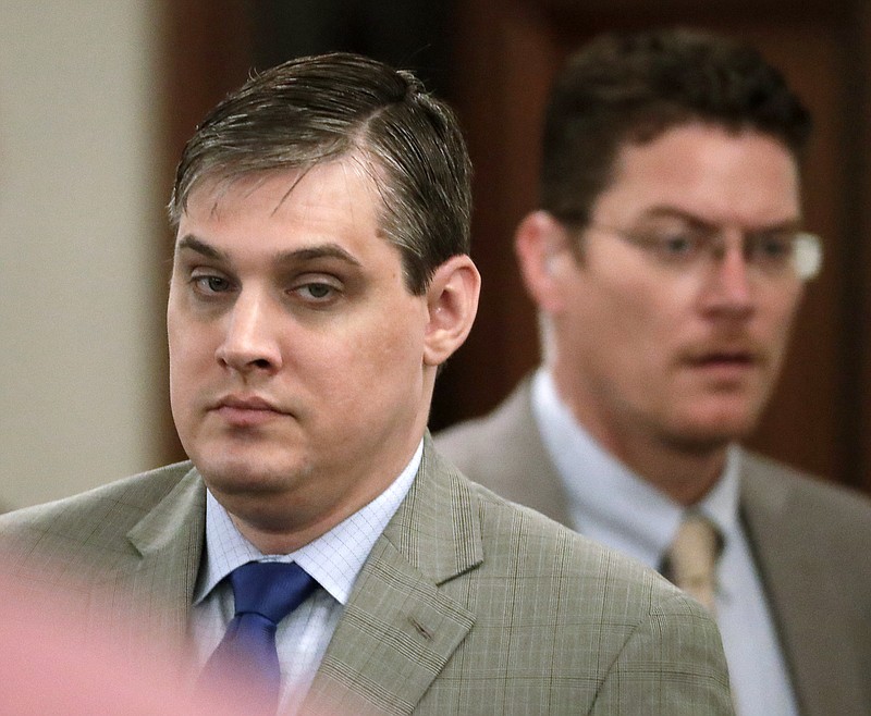 Zachary Adams, left, enters the courtroom after a break in his trial for the kidnapping, rape and murder of nursing student Holly Bobo on Sept. 11, 2017, in Savannah, Tenn. Bobo, 20, disappeared from her home in Parsons, Tenn. on April 13, 2011, and her remains were found in September 2014. (AP Photo/Mark Humphrey, Pool)