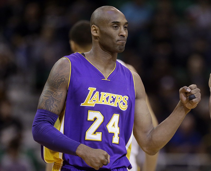 Kobe Bryant of the Los Angeles Lakers walks up court against the