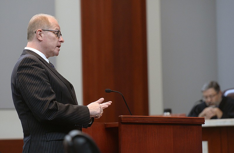 
              Attorney Edwin Wall speaks before the state Supreme Court, Tuesday Sept. 12, 2017, in Salt Lake City, for a married Utah gay couple over a law that prevents married gay men from having biological children through surrogacy. A gay couple denied the chance to have a baby using a surrogate challenged a Utah law's reference to heterosexual parents, which illustrates the legal complications LGBT couples can face when starting families amid a national patchwork of surrogacy laws. (Al Hartmann/The Salt Lake Tribune, via AP, Pool)
            