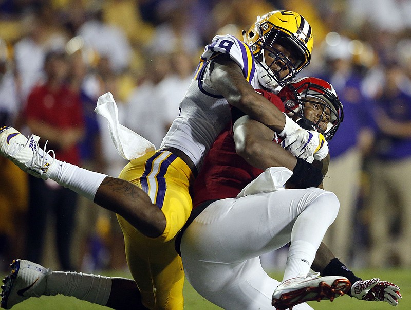 LSU defensive end Arden Key sacks Jacksonville State quarterback Eli Jenkins during their September 2016 game in Baton Rouge, La. Key, who had shoulder surgery in May, has missed the first two games this season but is expected to play Saturday night at Mississippi State.