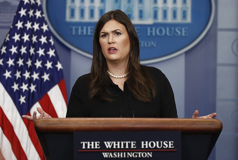 
              White House press secretary Sarah Huckabee Sanders speaks during a news briefing at the White House, in Washington, Wednesday, Sept. 13, 2017. Huckabee Sanders discussed tax reform, President Donald Trump's planned dinner tonight with House and Senate minority leaders, and other topics. (AP Photo/Carolyn Kaster)
            