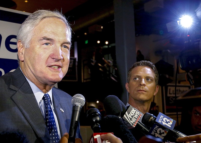 In this Aug. 15, 2017, file photo, Sen. Luther Strange speaks to media after forcing a runoff against former Chief Justice Roy Moore in Homewood, Ala. Strange on Tuesday, Aug. 29, launched his first salvo against Moore in the contentious Senate race, calling Moore a hypocrite "who has spent 40 years putting himself and his ambition ahead of Alabamians." (AP Photo/Butch Dill, File)