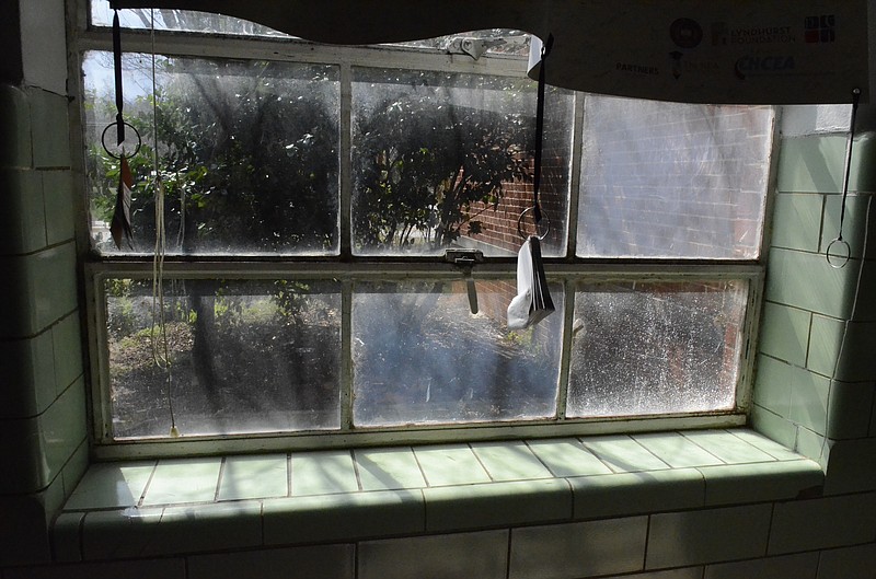 Staff file photo by John Rawlston/Chattanooga Times Free Press - Old windows like this one photographed in 2014 are in use throughout the building at the Chattanooga School for the Liberal Arts.