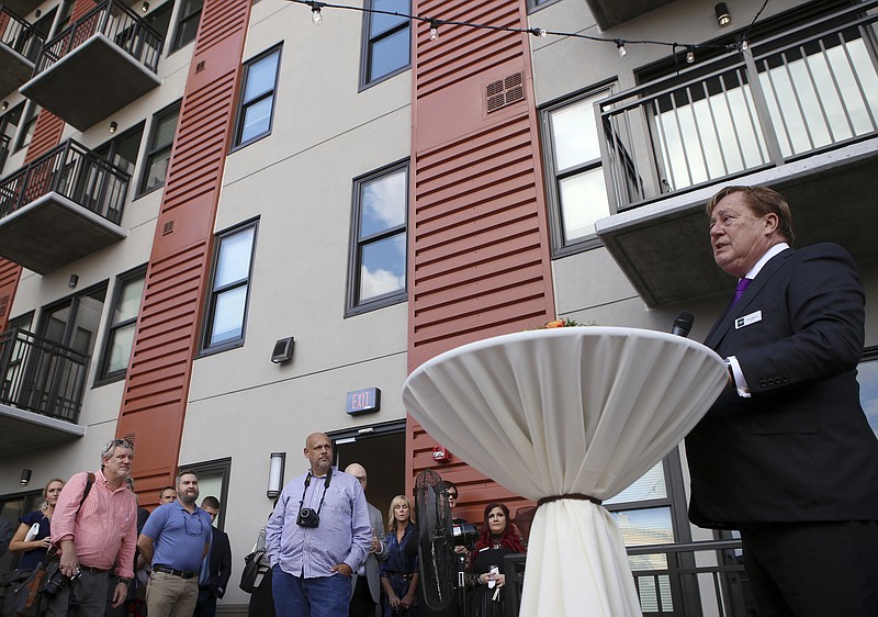 Boyd Simpson, head of The Simpson Organization, speaks during the official opening of Market City Center on Thursday, Sept. 14, in Chattanooga, Tenn.