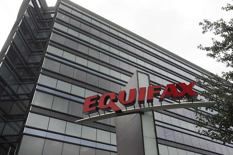 
              FILE - This July 21, 2012, file photo shows Equifax Inc., offices in Atlanta. On Monday, Sept. 11, 2017, Equifax said it has made changes to address customer complaints since it disclosed a week earlier that it exposed vital data on about 143 million Americans. Equifax has come under fire from members of Congress, state attorneys general, and people who are getting conflicting answers about whether their information was stolen. Equifax is trying again to clarify language about people’s right to sue, and said Monday it has made changes to address customer complaints. (AP Photo/Mike Stewart, File)
            