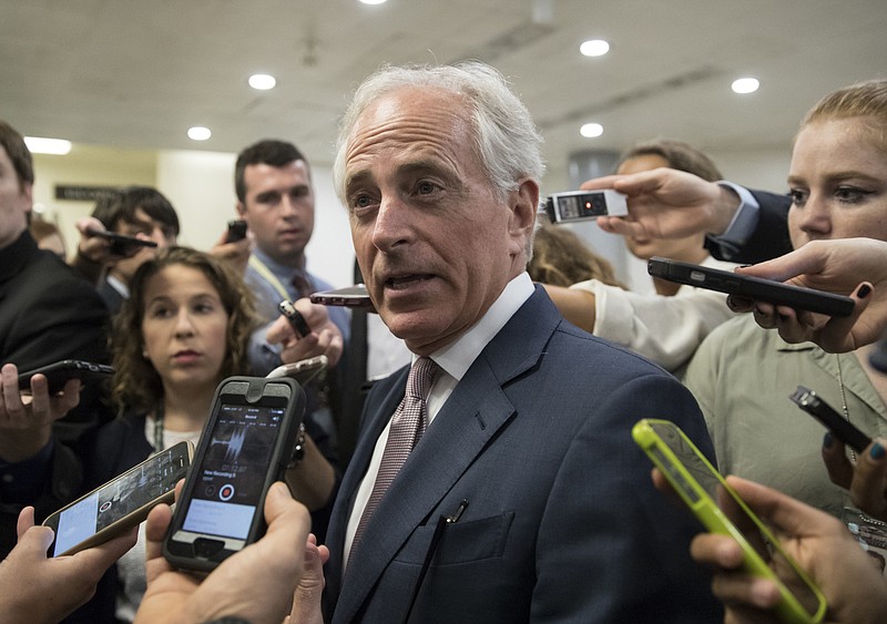 
              FILE - In this July 27, 2017, Senate Foreign Relations Committee Chairman Sen. Bob Corker, R-Tenn. talks to reporters on Capitol Hill in Washington. Corker said Sept. 11, 2017, he is unsure about running for re-election, injecting fresh doubts into the GOP's efforts to tighten its hold on the Senate majority next year. (AP Photo/J. Scott Applewhite, File)
            