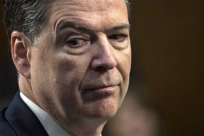 
              In this June 8, 2017 photo, former FBI director James Comey testifies before the Senate Select Committee on Intelligence, on Capitol Hill in Washington.  The Republican attacks on fired FBI Director James Comey have sharply intensified in the last two weeks, with broadsides delivered on Twitter, public statements and even from the White House podium.  (AP Photo/J. Scott Applewhite)
            